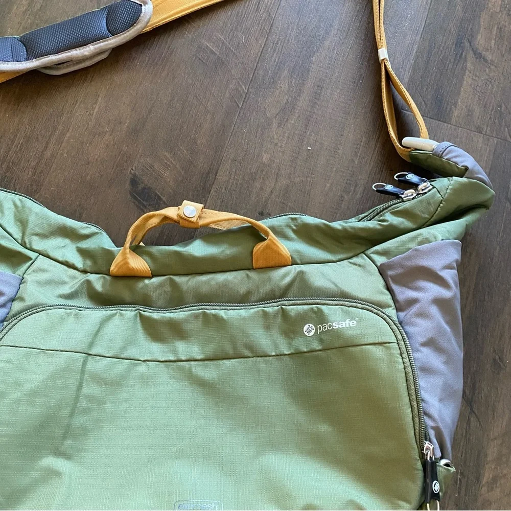 Pacsafe Olive Green and Mustard Yellow Crossbody Camera Bag